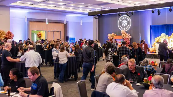 Farmfair International room full of people at event