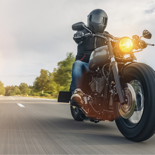 Motorcycle driver on the road.